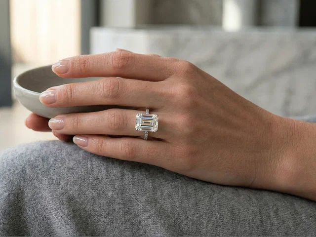 Ladies Hand With Emerald Cut Diamond Engagement Ring